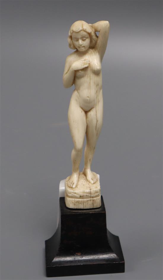 A Dieppe carved ivory figure of a girl height 15cm